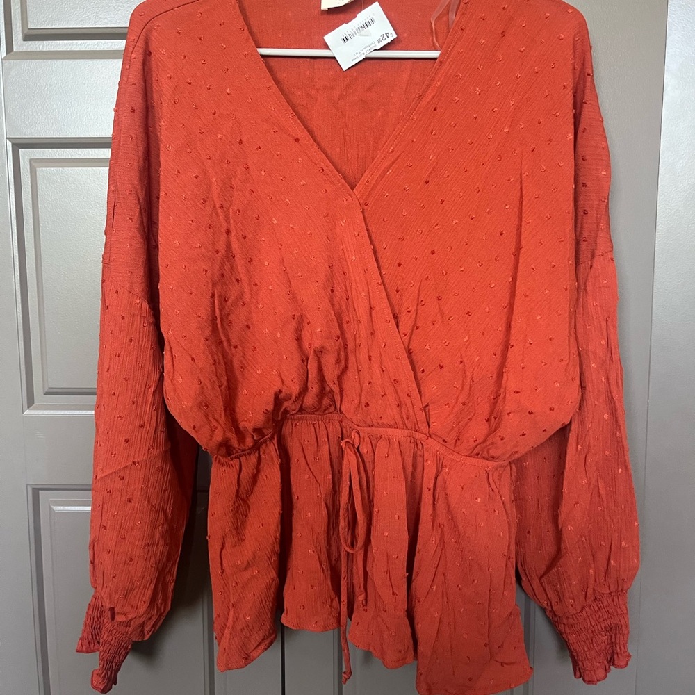 Boutique Peplum Style with Tie long Sleeve V-Neck Top